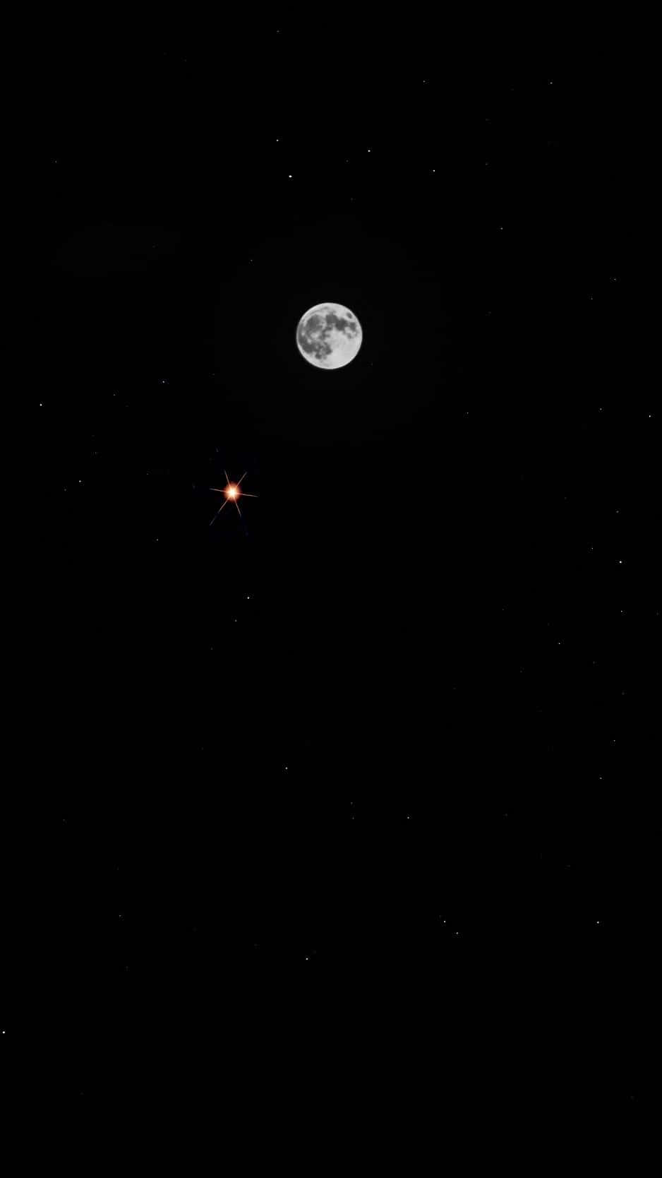 Laluna E Venere Su Iphone. Sfondo