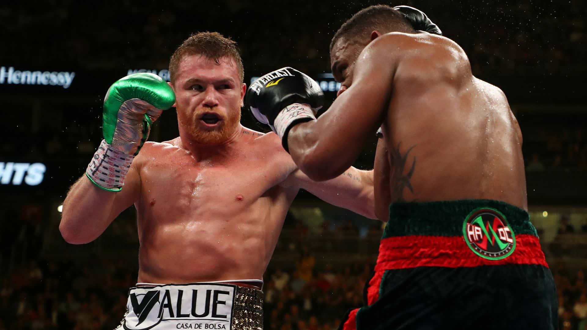 The Power-packed Punch: Saul Canelo Alvarez In Action Wallpaper