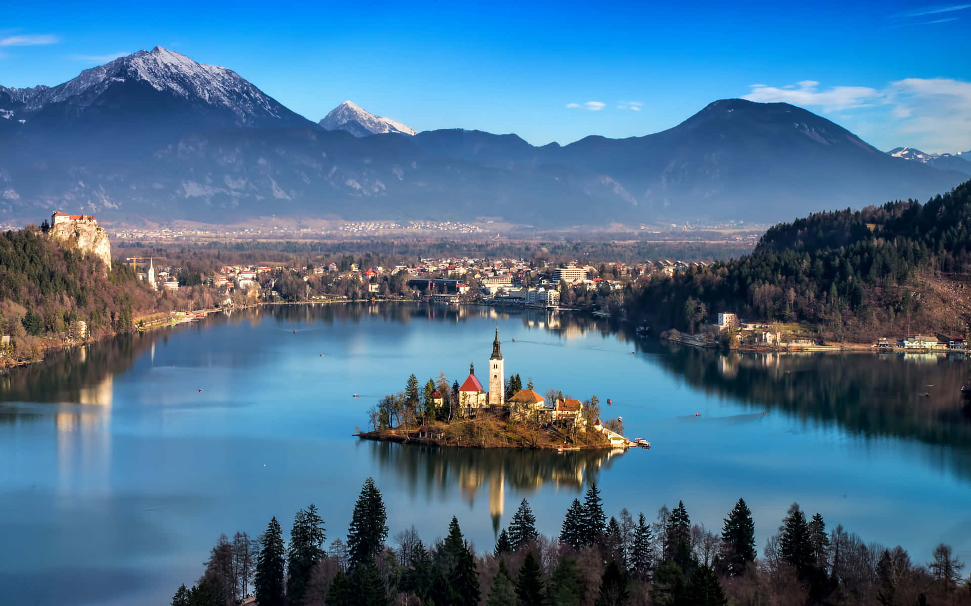 Caption: Enchanting View of Island Church on Lake Bled Wallpaper
