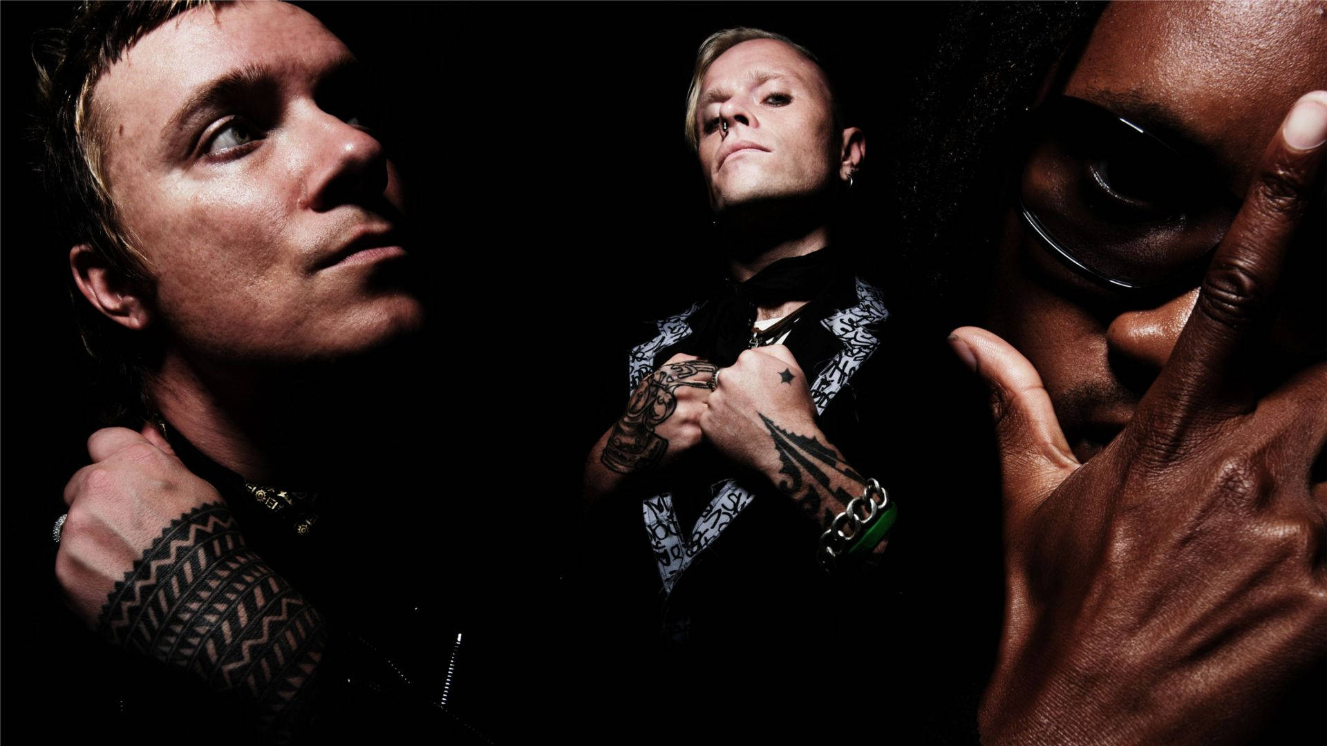 Download The Prodigy Band Members Wallpaper | Wallpapers.com