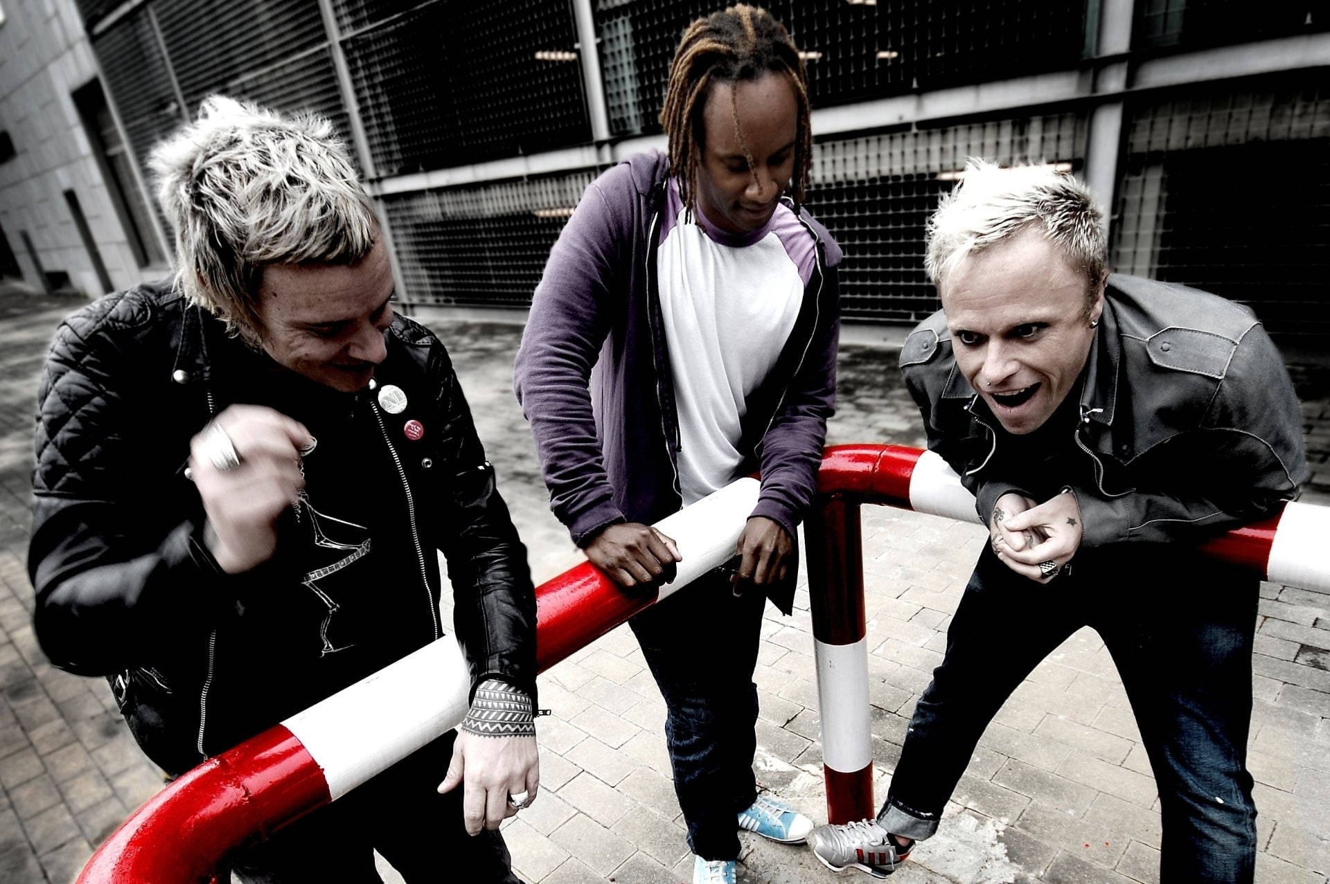 The Prodigy Outside A Parking Lot Wallpaper