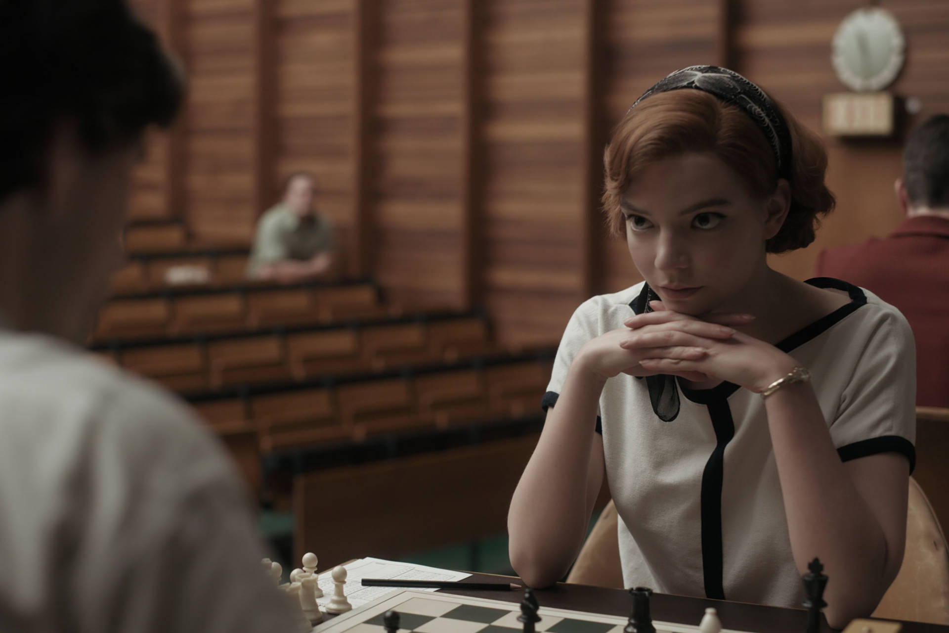 Deep in thought while playing chess - Beth Harmon in The Queen's Gambit Wallpaper