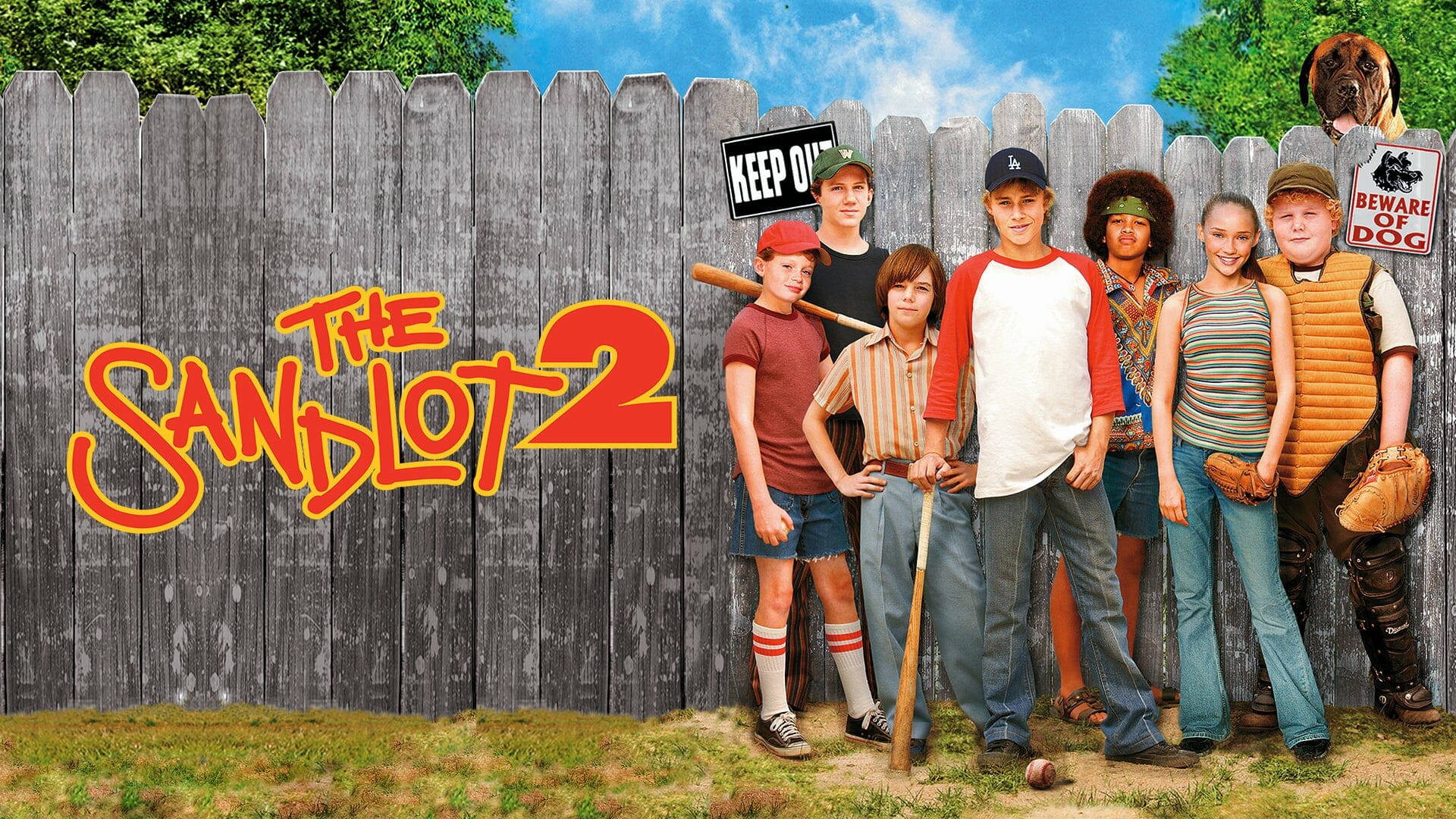 The Sandlot 2 Poster With The Characters Standing In Front Of A Fence Wallpaper