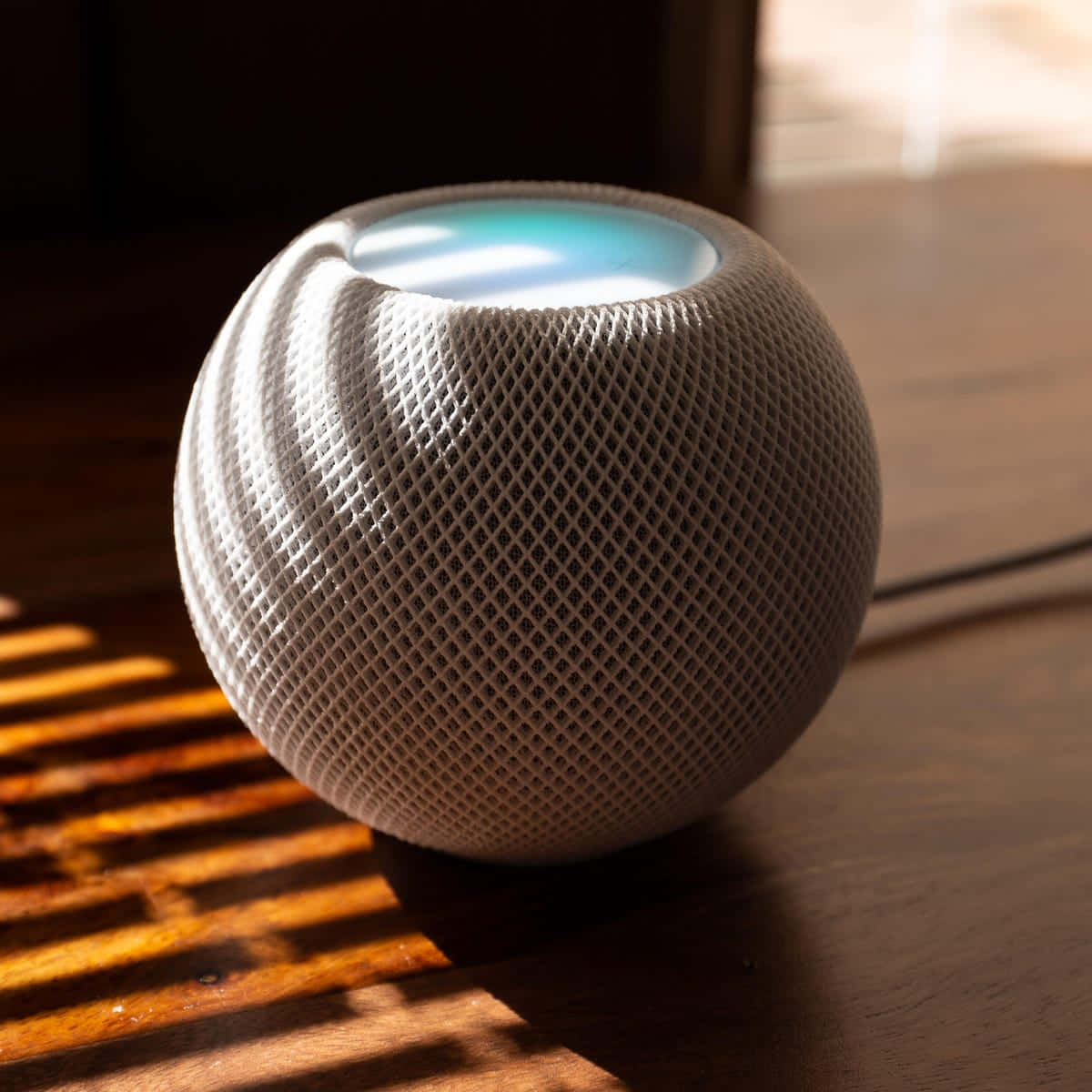 The Sleek And Stylish Apple Homepod, Perfect For Any Home Decor. Wallpaper