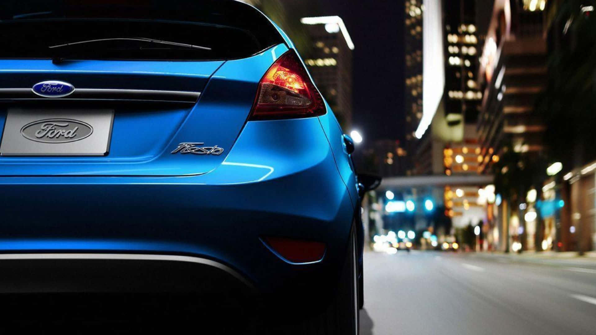 The Sleek And Stylish Ford Fiesta On A Road Adventure Wallpaper