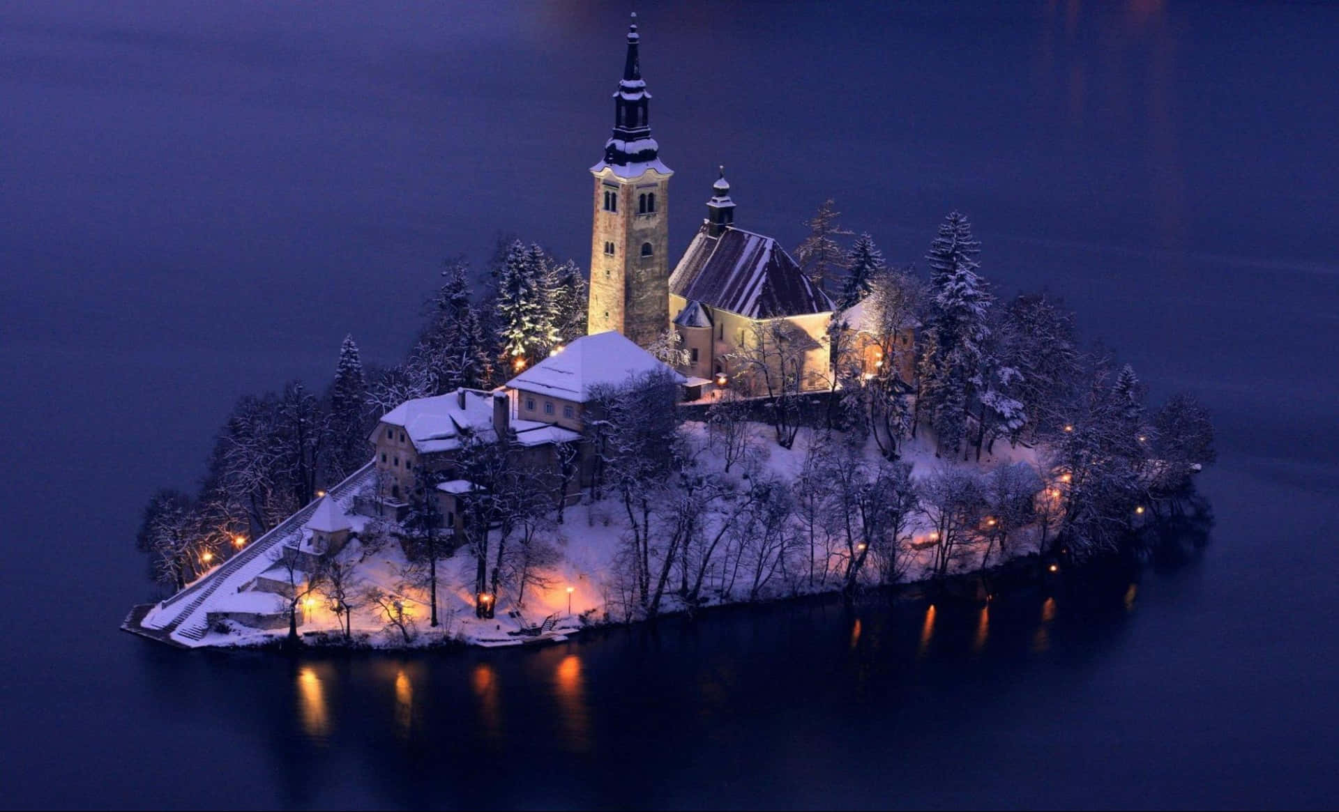 The Snowed Island In Lake Bled At Night Wallpaper