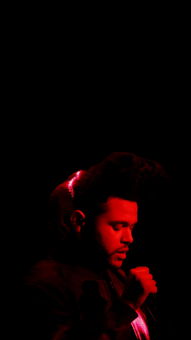 Opgradér din oplevelse med en iPhone og lyt til The Weeknd. Wallpaper