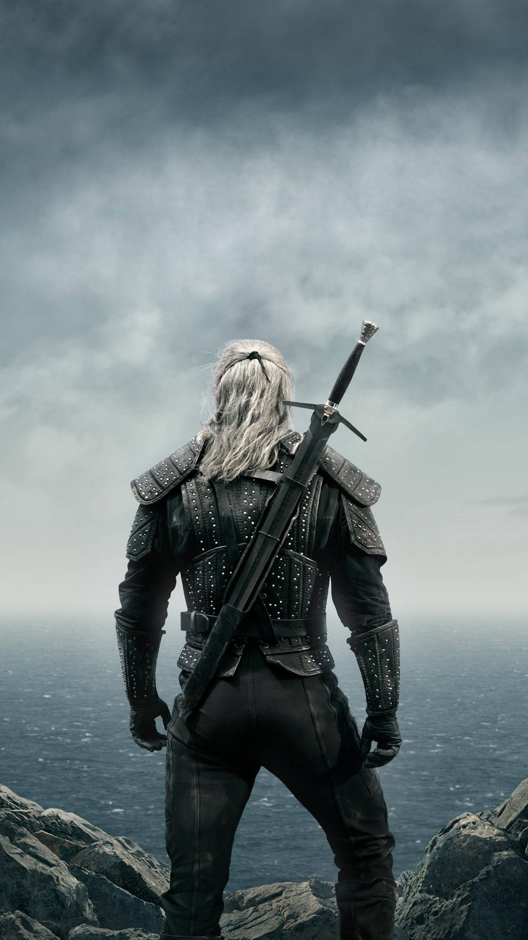 The Witcher – Geralt of Rivia Preparing for Battle Wallpaper