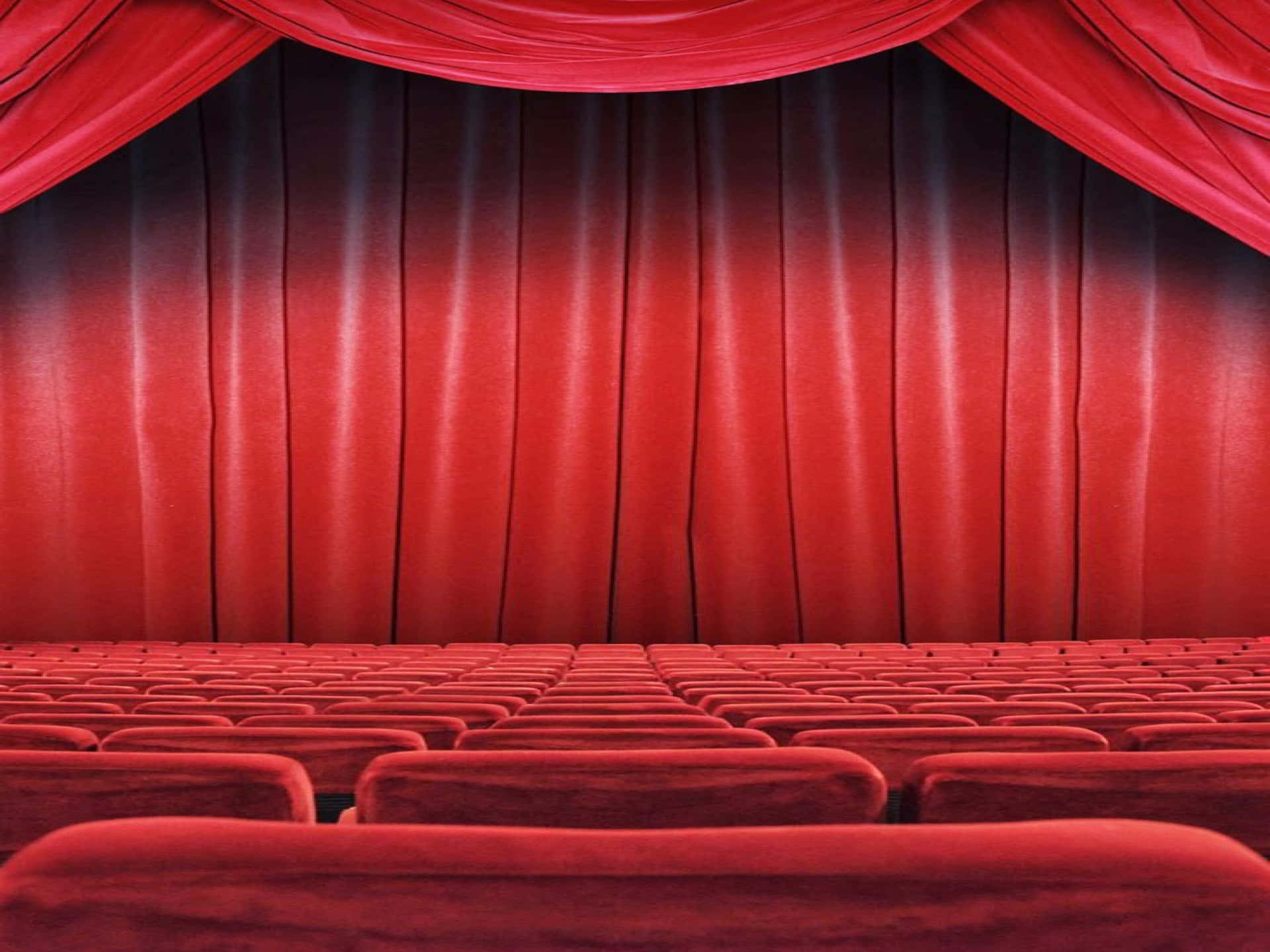 Theater With Glossy Red Curtains Wallpaper