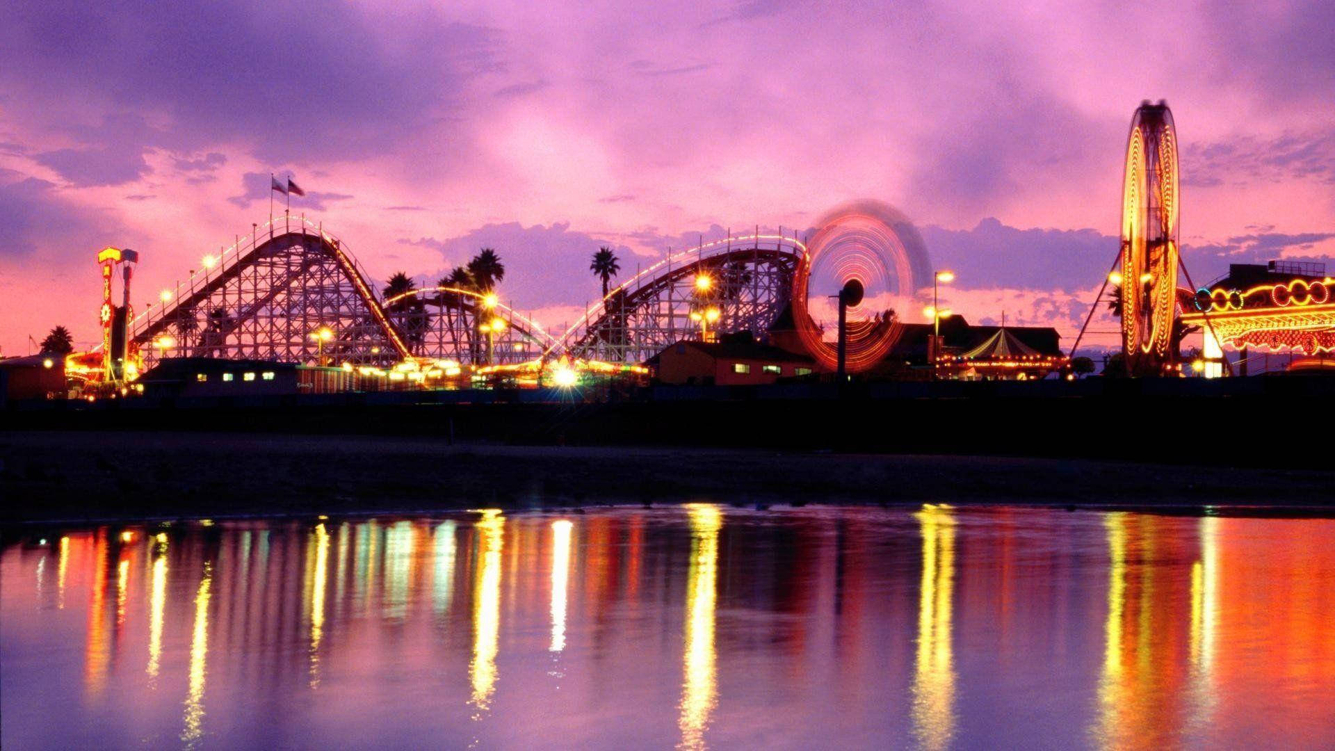 Theme Park Sunset Silhouette Wallpaper