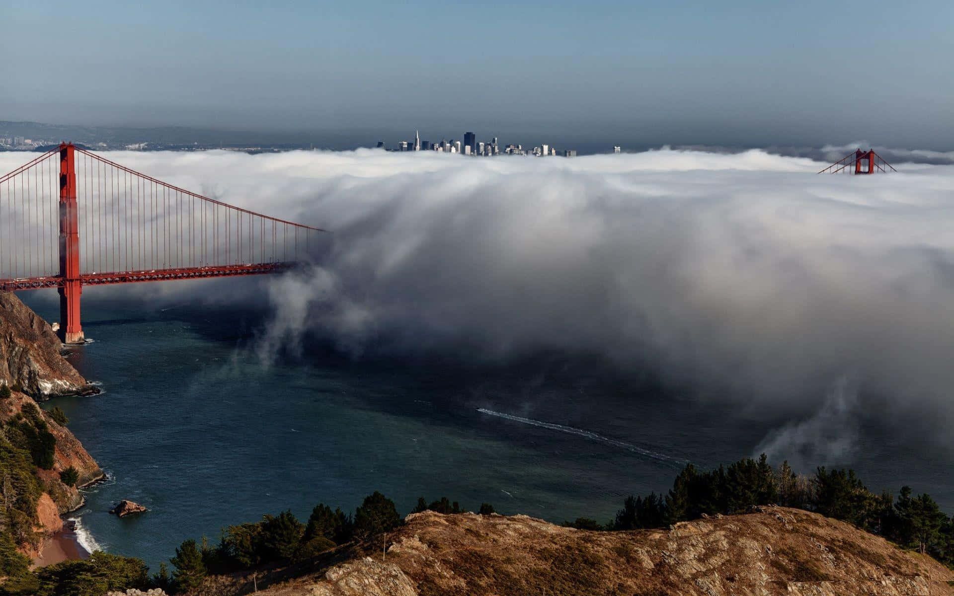 Thick Fog Rolling In Golden Gate Bridge Wallpaper