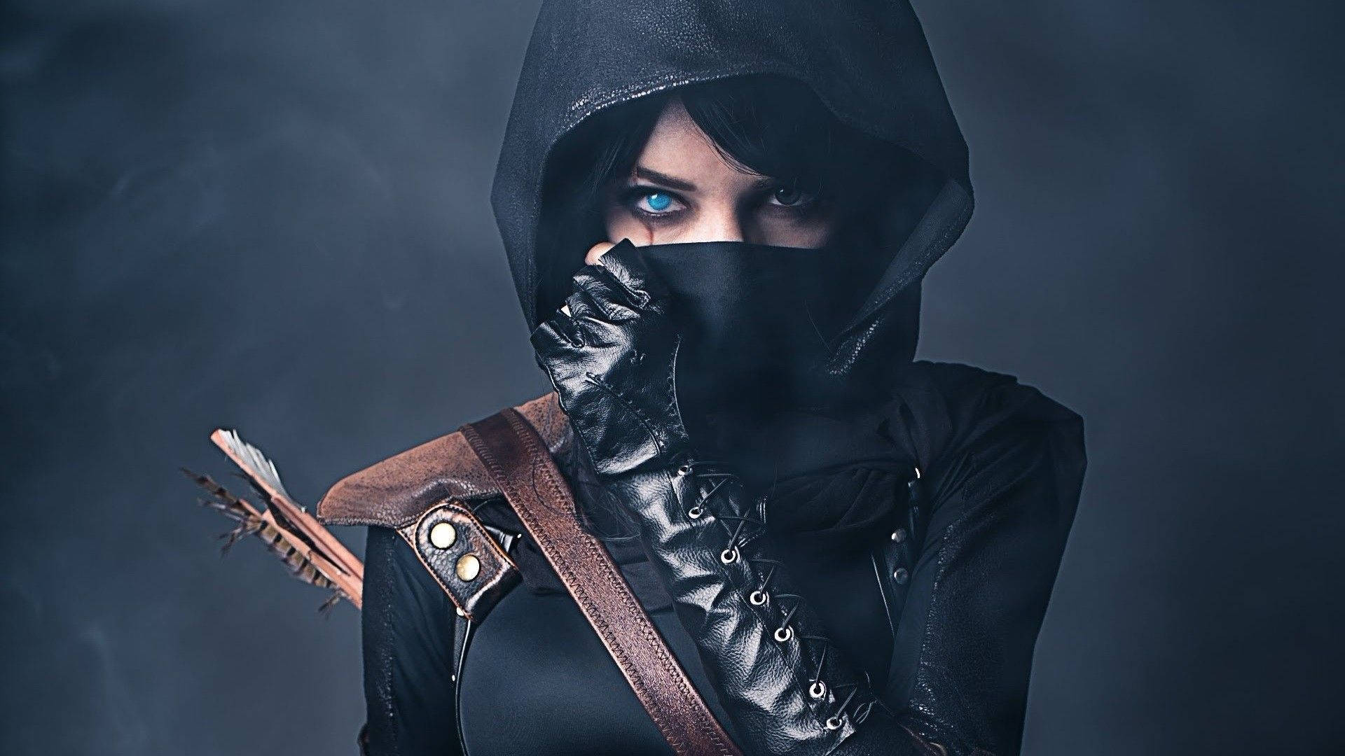 Thief Covering Her Face Wallpaper