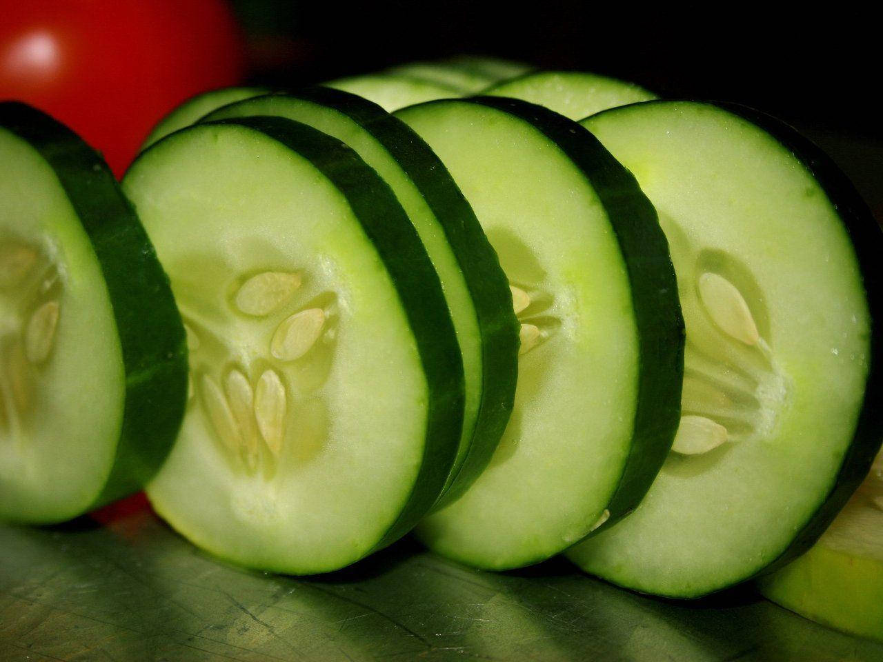 Thinly Sliced Cucumber Fruits With Seeds Wallpaper