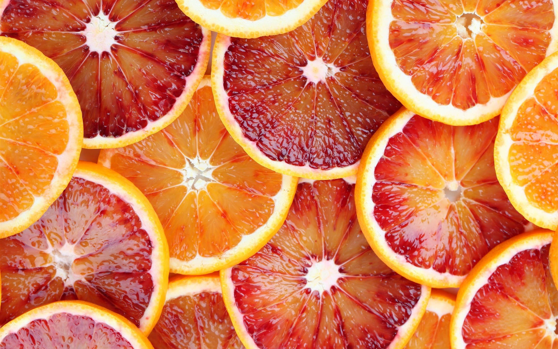 Thinly Sliced Grapefruits In Gradient Color Wallpaper