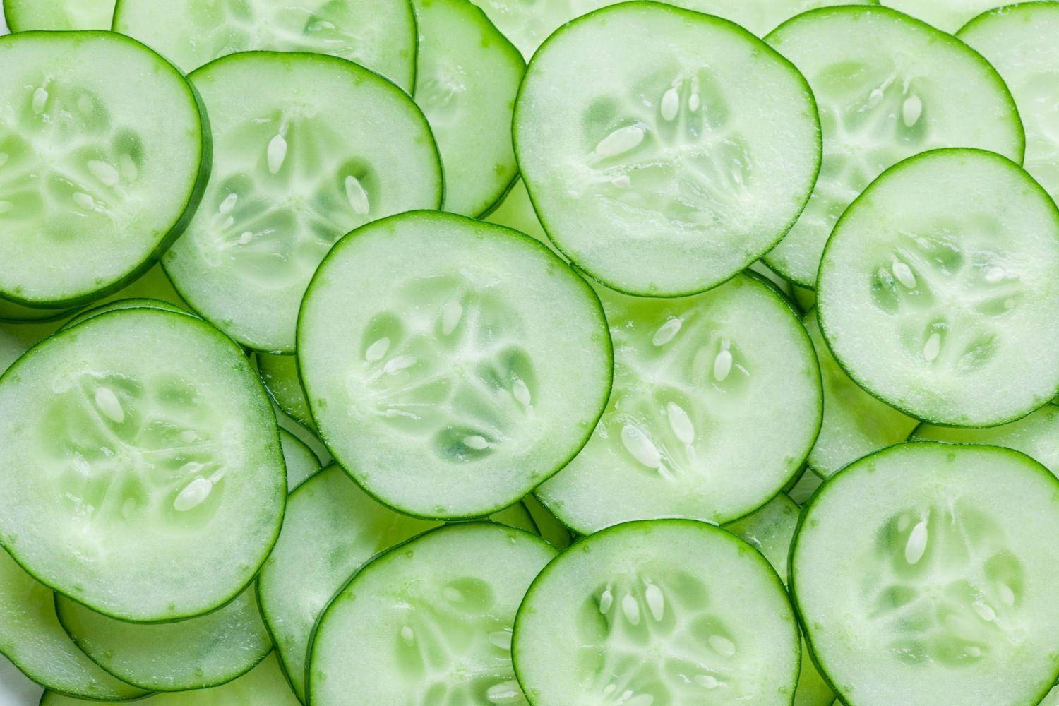 Thinly Sliced Green Cucumber Fruits Wallpaper