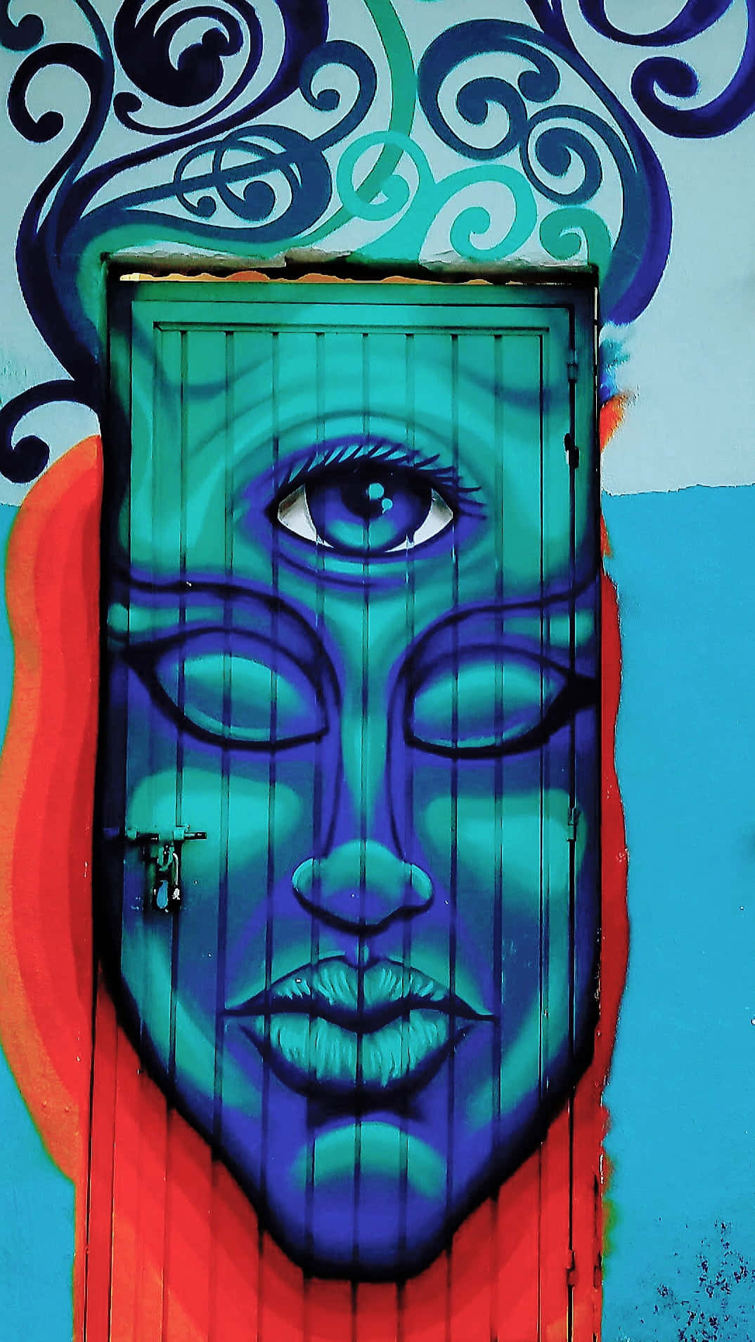 Enblå Dörr Med Ett Blått Ansikte På Det Wallpaper