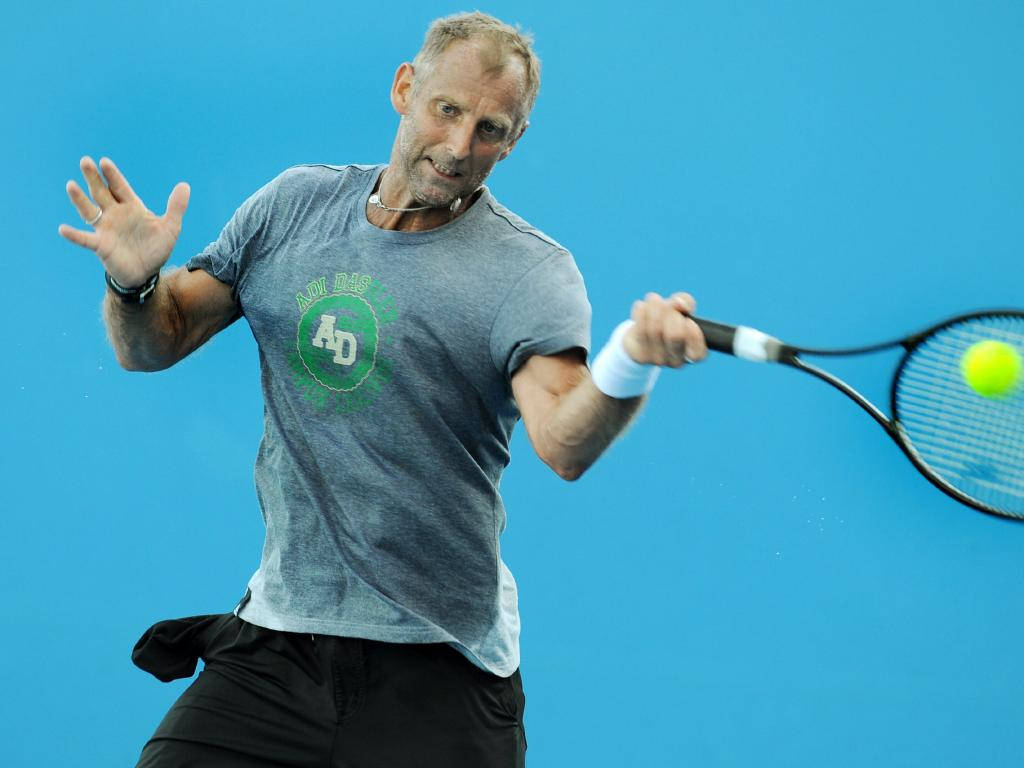 Thomas Muster On Blue Background Wallpaper