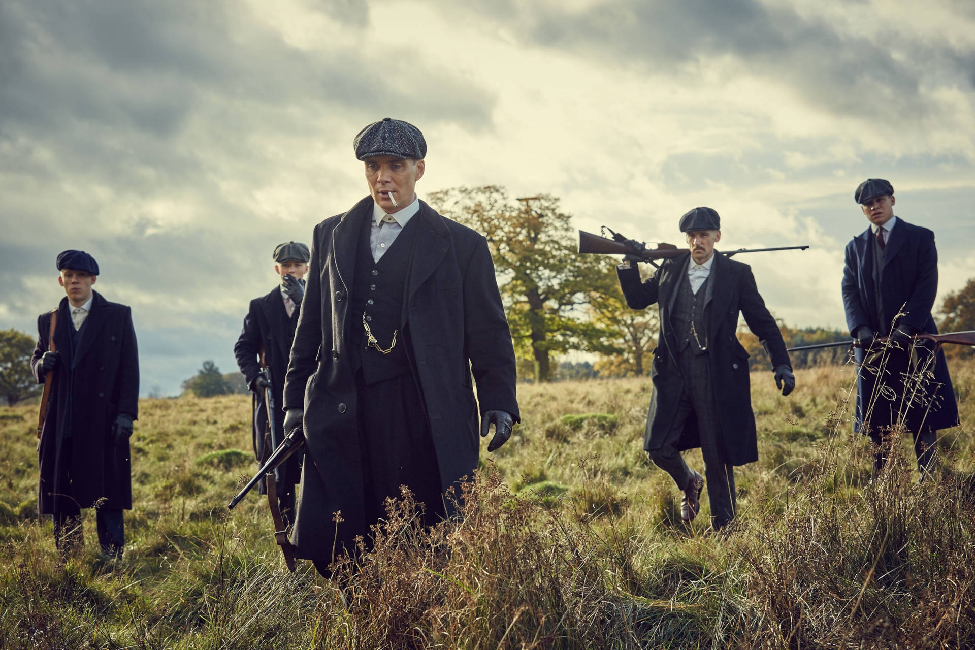 Thomas Shelby Walking With Brothers Wallpaper