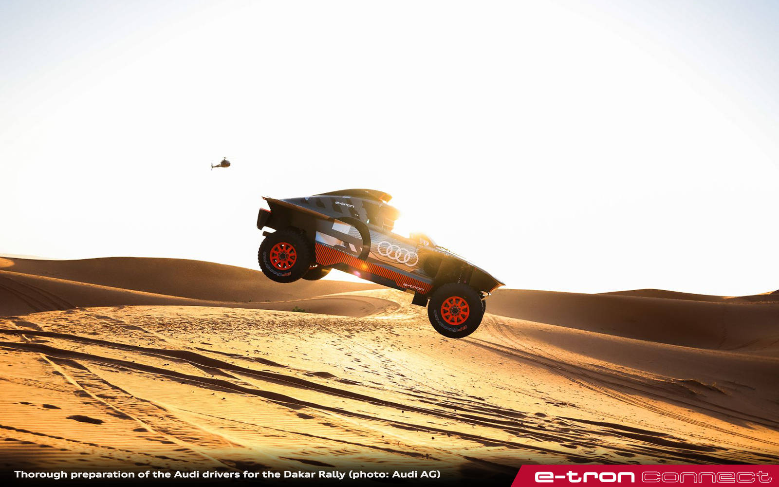 Epic Leap Over Sand Dunes Wallpaper