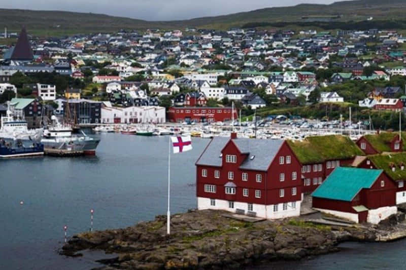 Thorshavn Boats, Houses, And Flag Wallpaper