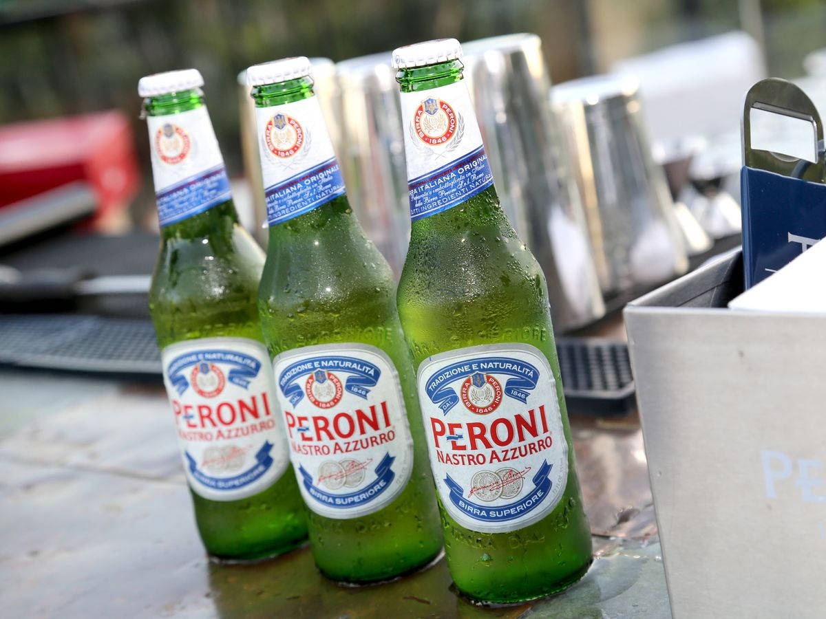 Three Bottles Of Cold Peroni Beer Wallpaper