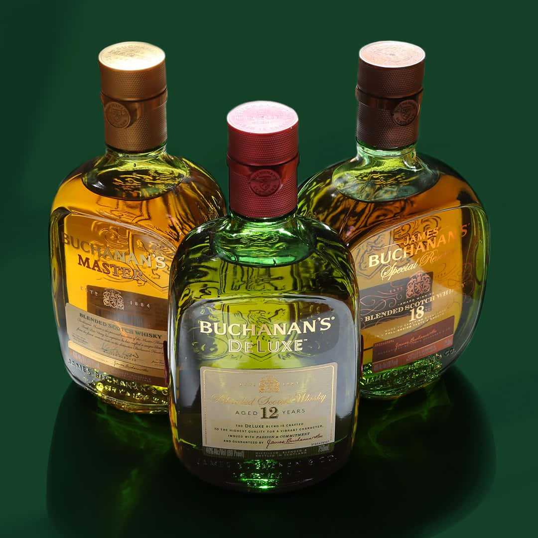 Three Buchanan's Blended Whiskey Bottles Wallpaper