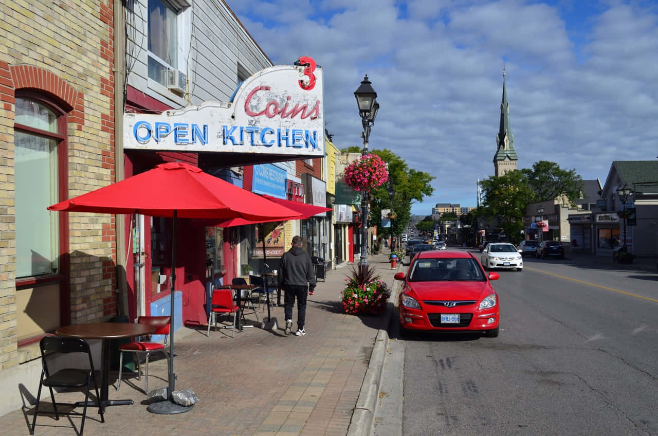 Three Coins Open Kitchen Restaurant Street View Wallpaper