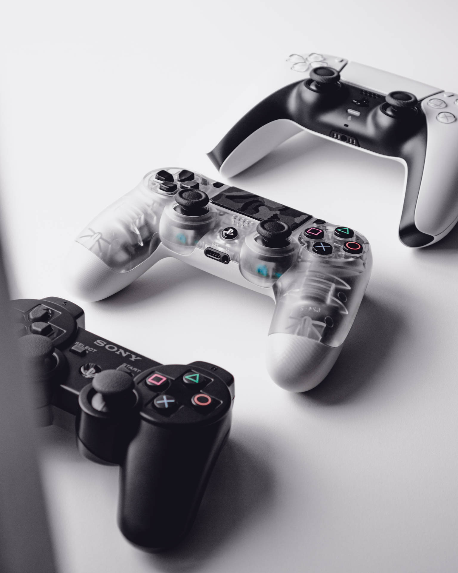 Three Different Ps3 Controllers Wallpaper
