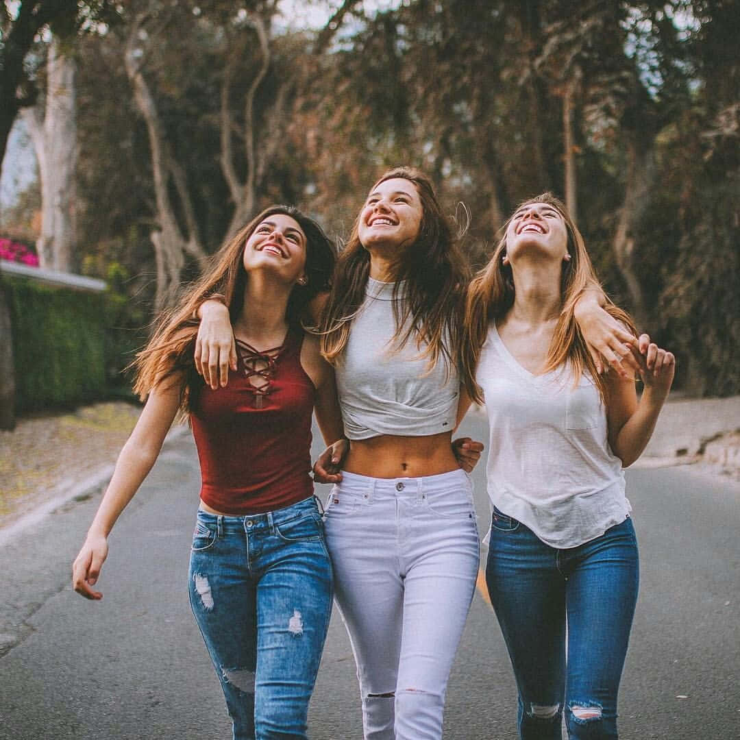 Three Friends in Optimistic Pose Stock Image - Image of school, female:  29782723