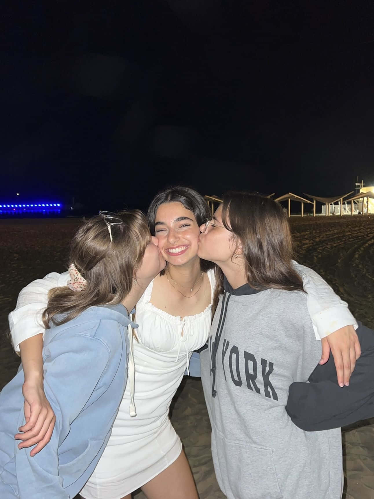 Three Friends Kissing Cheeks Picture