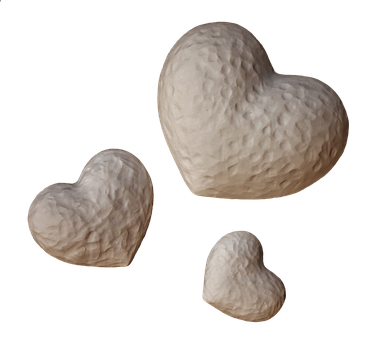 Three Heart Stoneson Black Background PNG