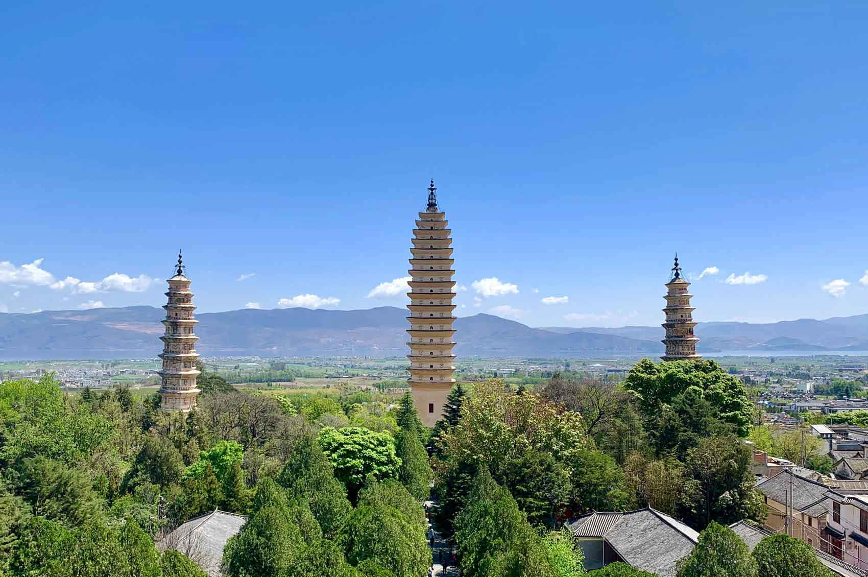 Three Pagodas During Daytime Wallpaper