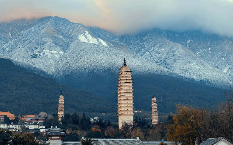 Three Pagodas With Mountain View Wallpaper