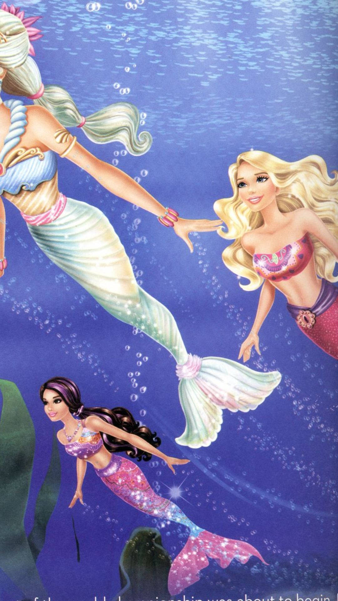 Three Swimming Barbie Mermaids Wallpaper