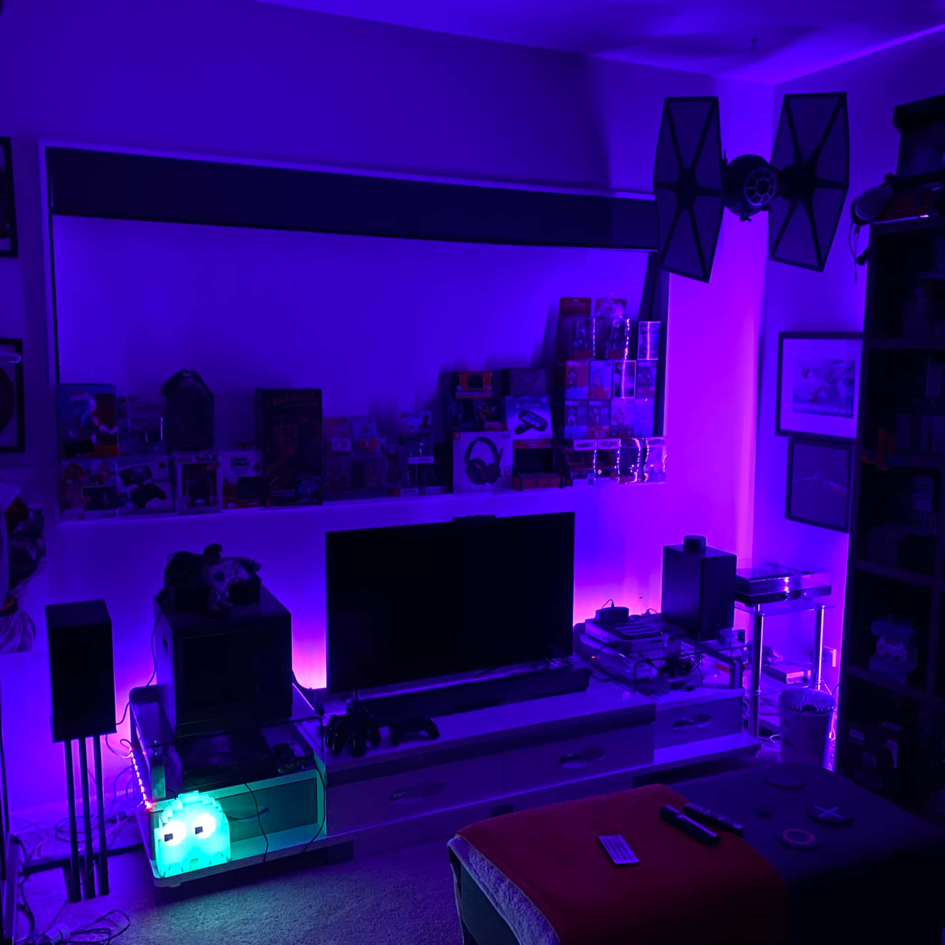 Thrilling Gaming Setup In Neon Glow