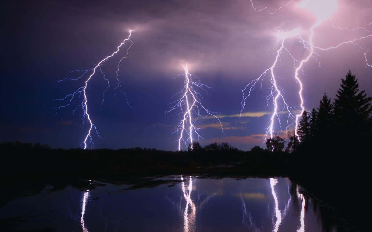Surrounded by darkness, a lightning bolt pierces through the sky