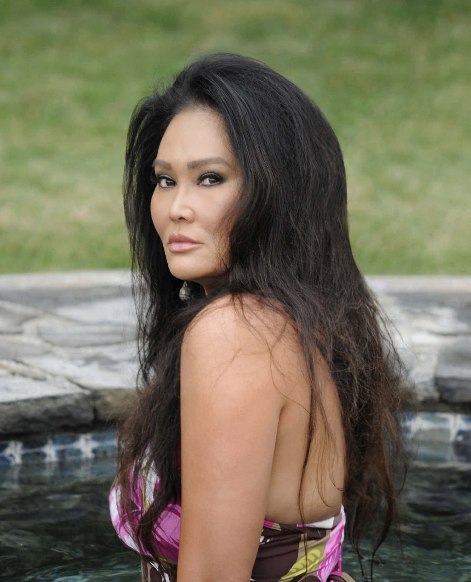Tia Carrere Glowing Radiantly At A Celebrity Gala Event Wallpaper