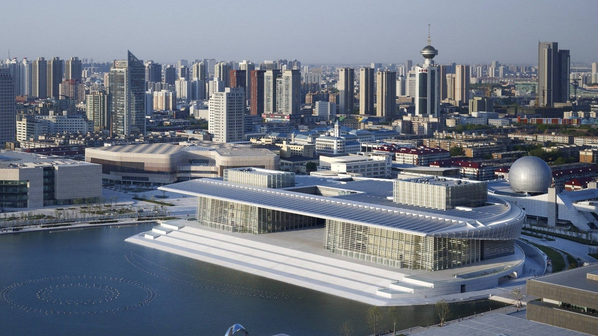 Fazersua Tela Do Dispositivo Brilhar Com O Centro Nacional De Convenções De Tianjin. Papel de Parede