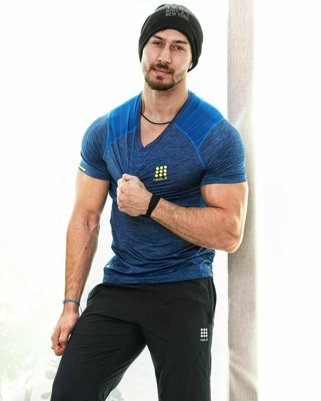 Tiger Shroff Flaunts His Chiseled Physique in a Blue Shirt Wallpaper