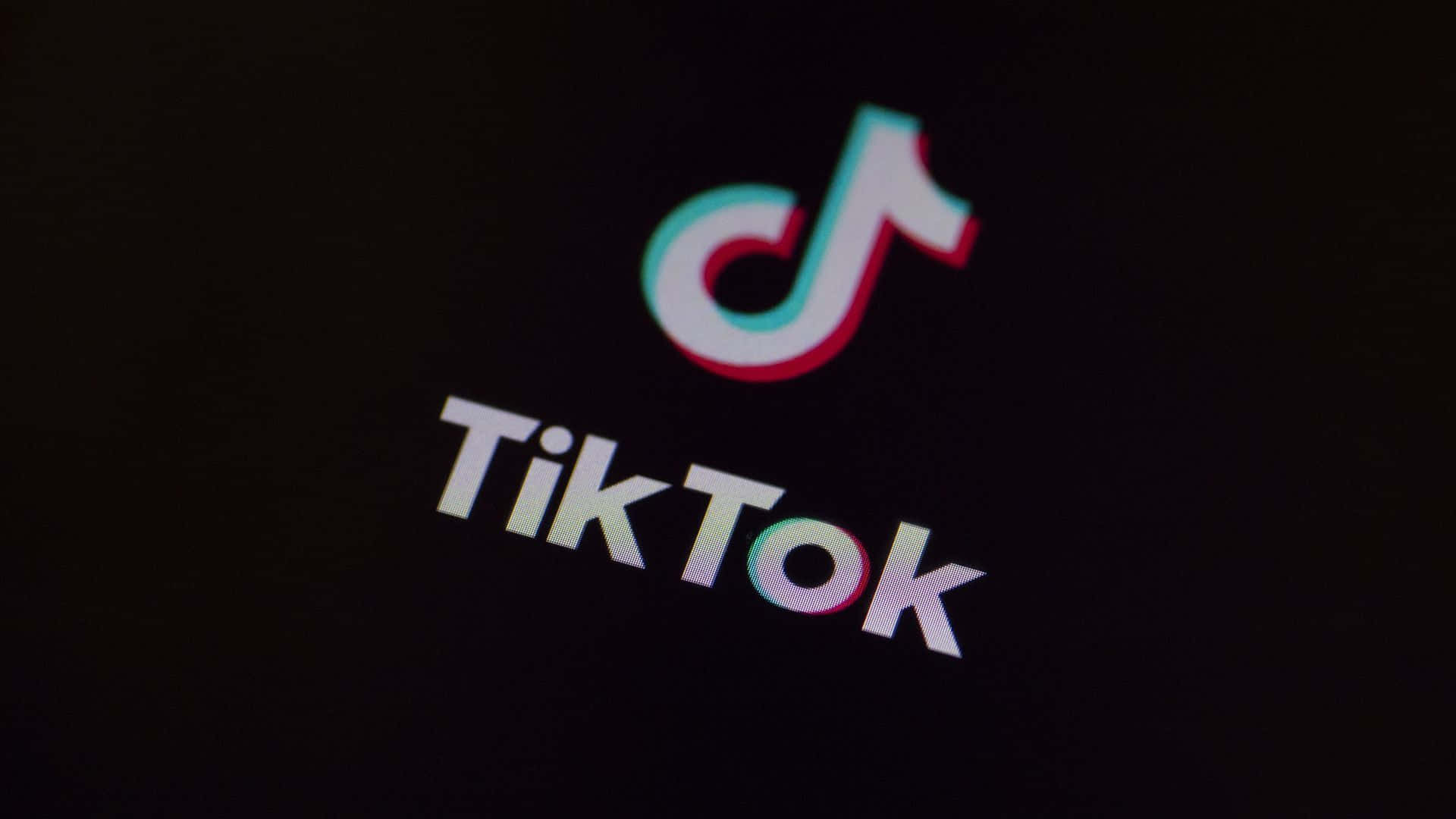 tiktok logo on a black screen