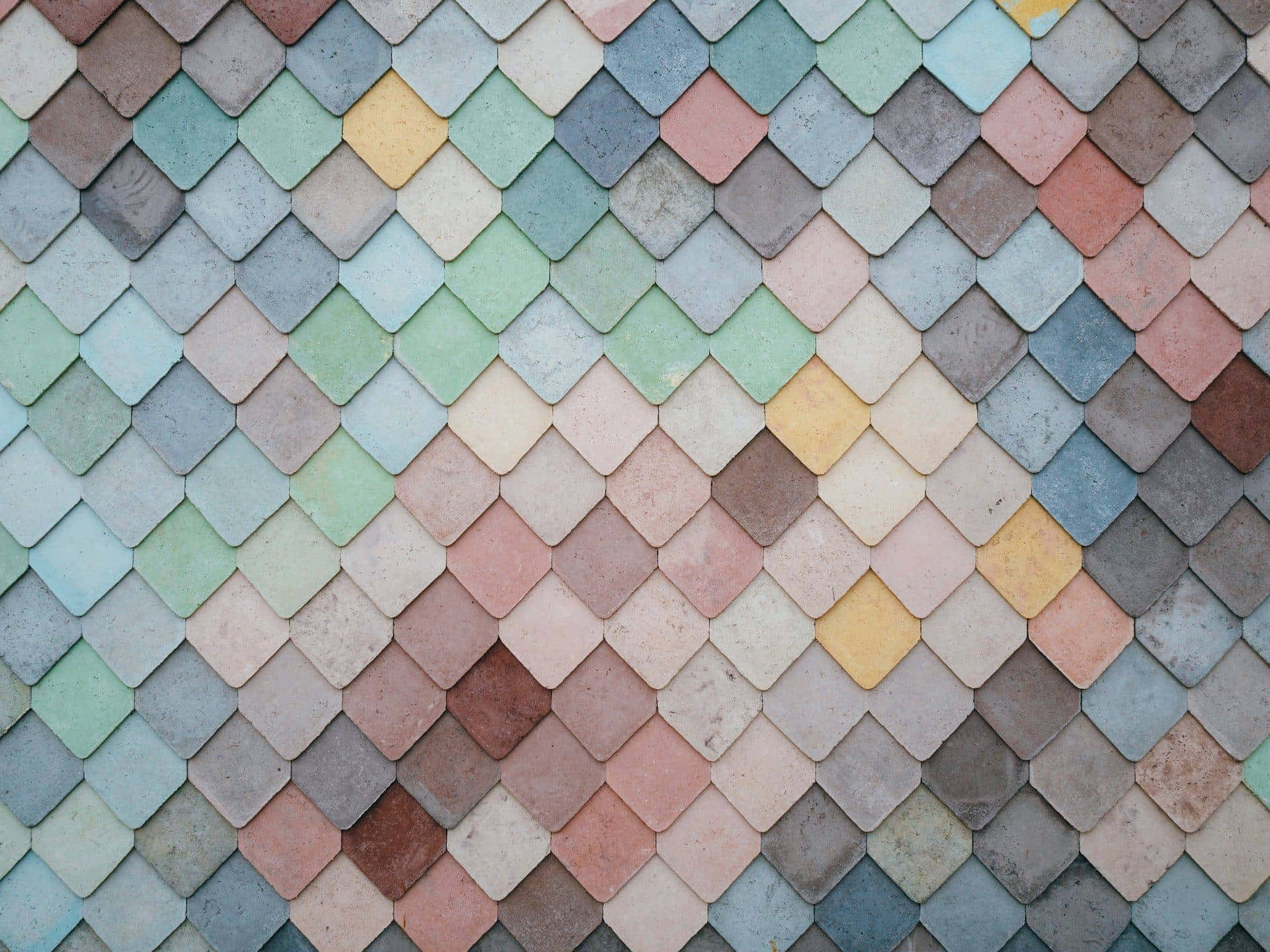 A Colorful Tiled Roof With A Pattern Of Different Colors