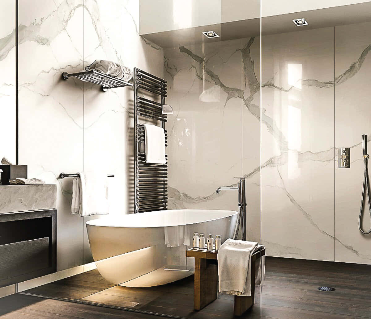 A Bathroom With Marble Walls And A Bathtub