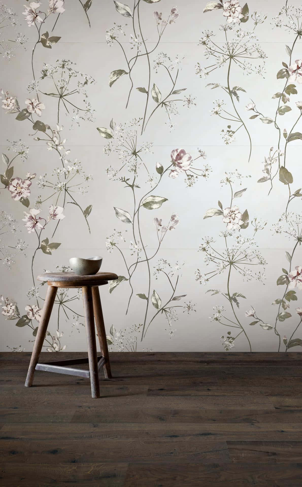 A Wallpaper With A Floral Pattern And A Stool