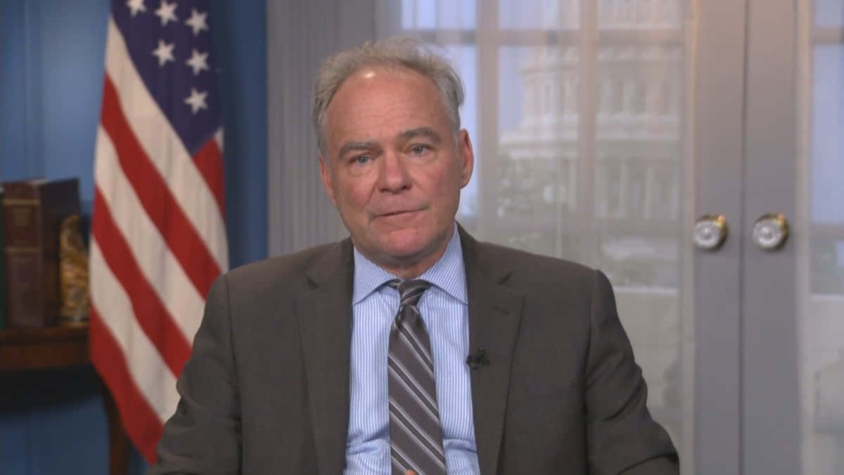 Influential figure, Tim Kaine, in a professional gray suit Wallpaper