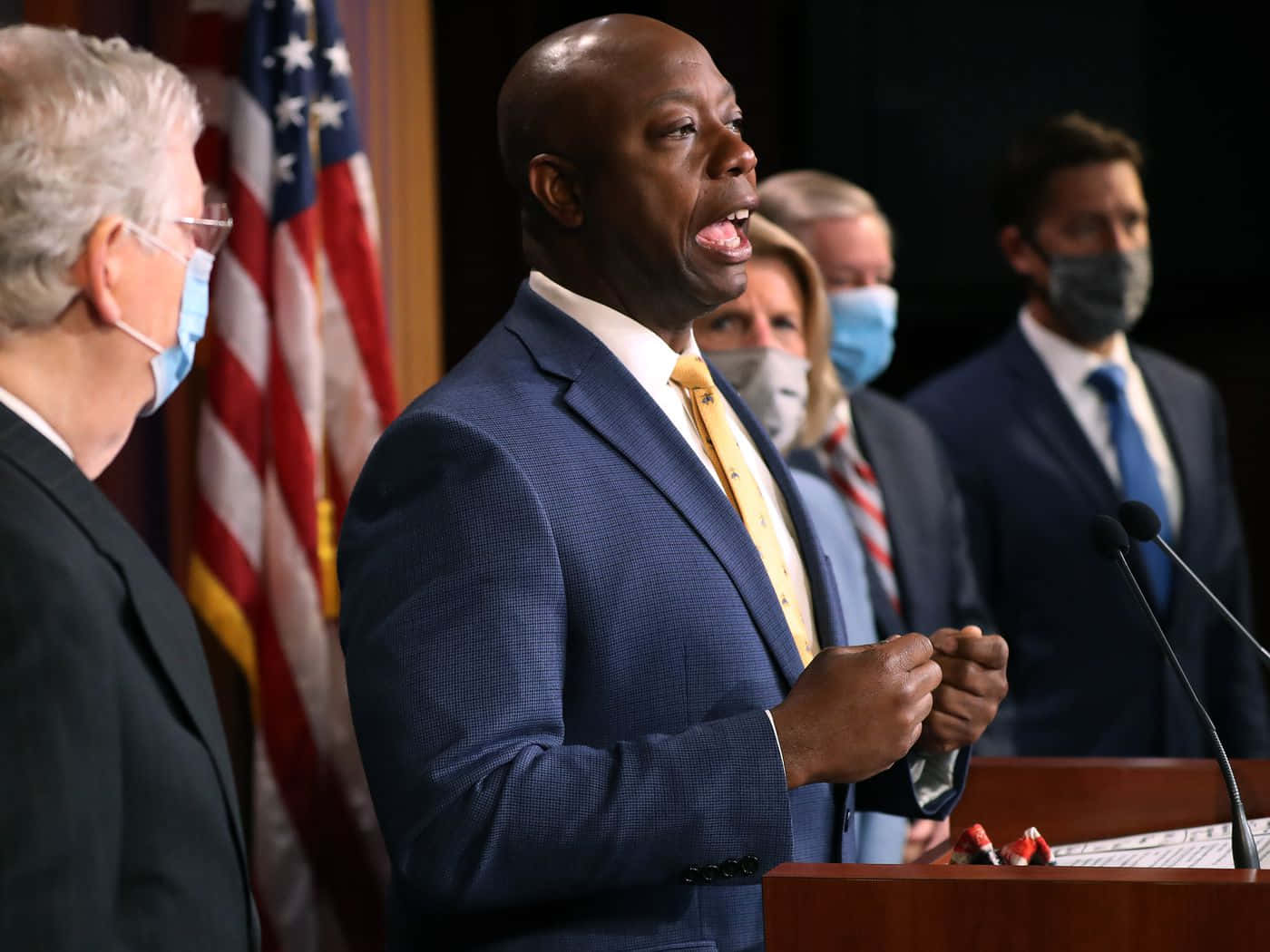 Tim Scott Speaking In A News Conference Wallpaper