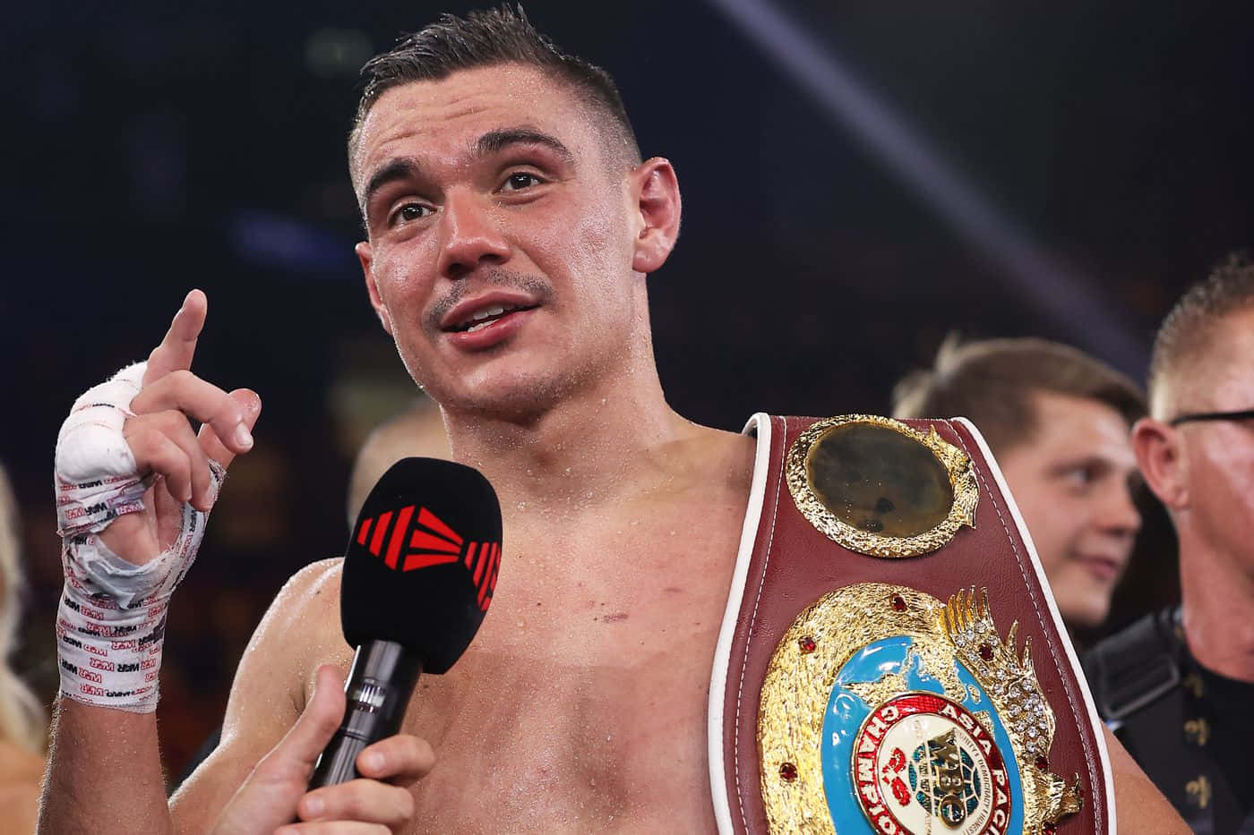 Professional boxer Tim Tszyu in action during a match Wallpaper
