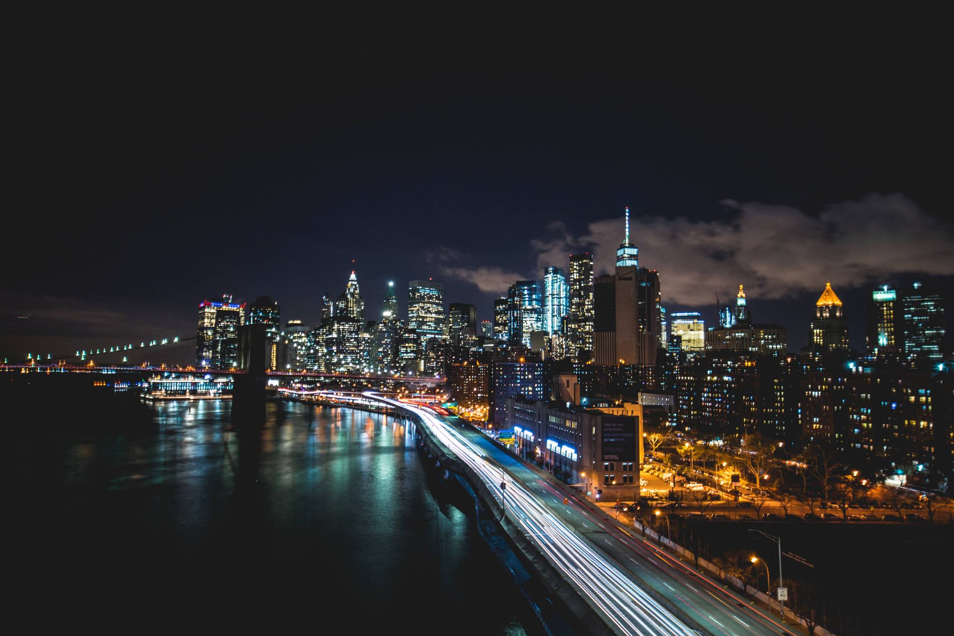 Zeitrafferansichtder Nächtlichen Skyline Von New York City Wallpaper
