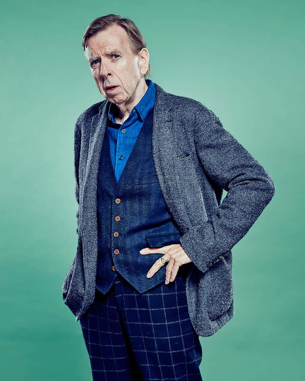 Timothy Spall posing for a portrait Wallpaper