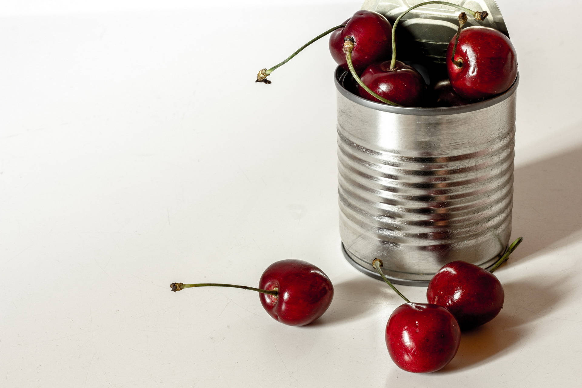 Tin Can Filled With Cherries Wallpaper