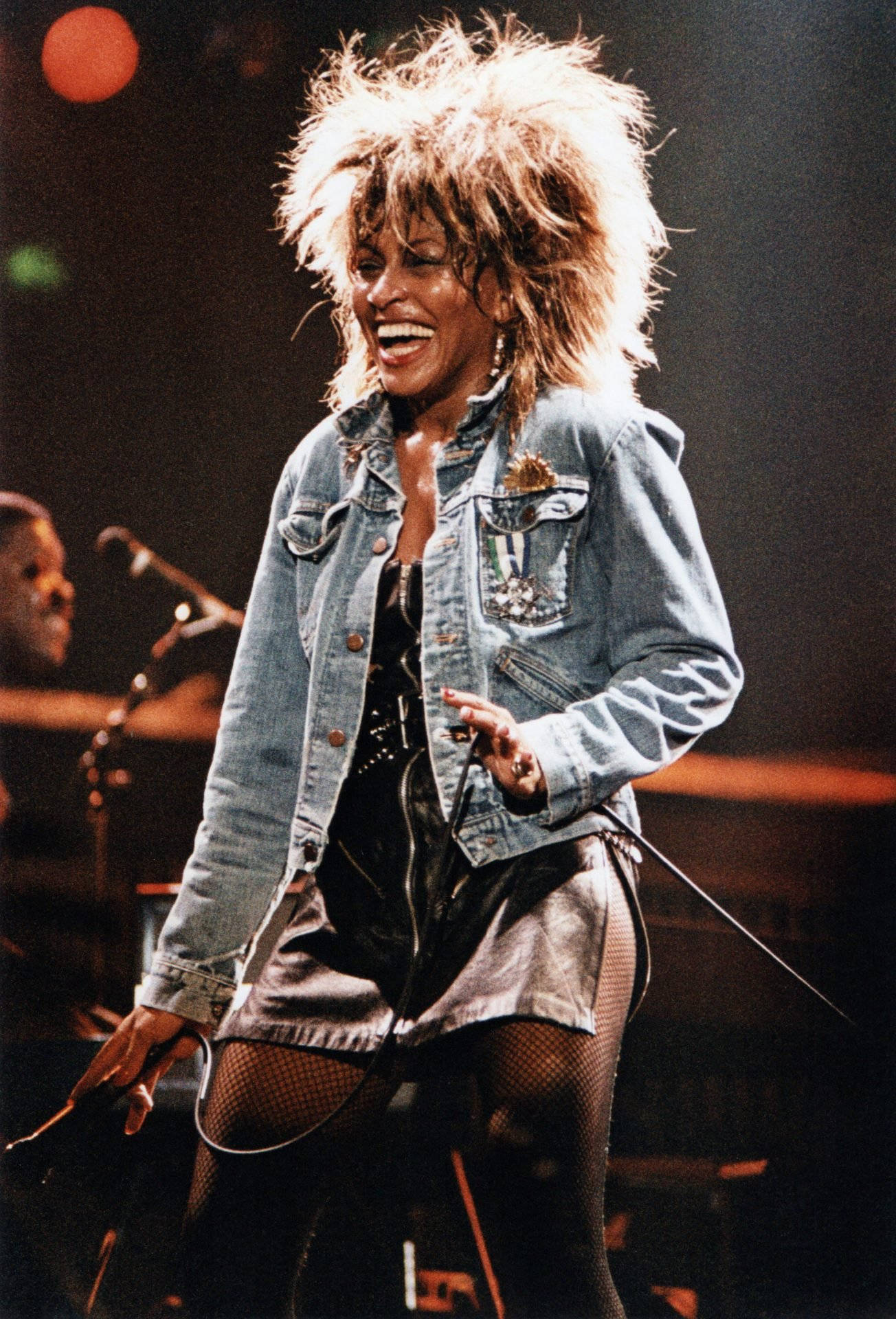 Tina Turner Glows at Punk Rock Performance Wallpaper